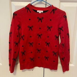 Red and black bow sweater